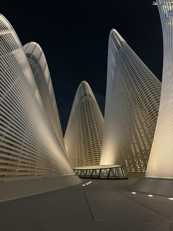 Etihad Towers and the Abu Dhabi waterfront skyline.